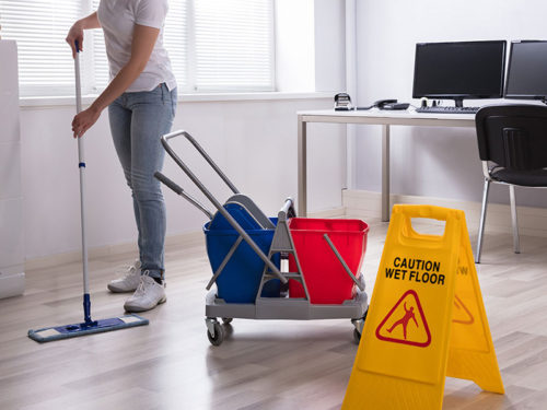woman-cleaning-floor-of-office-derry-nh